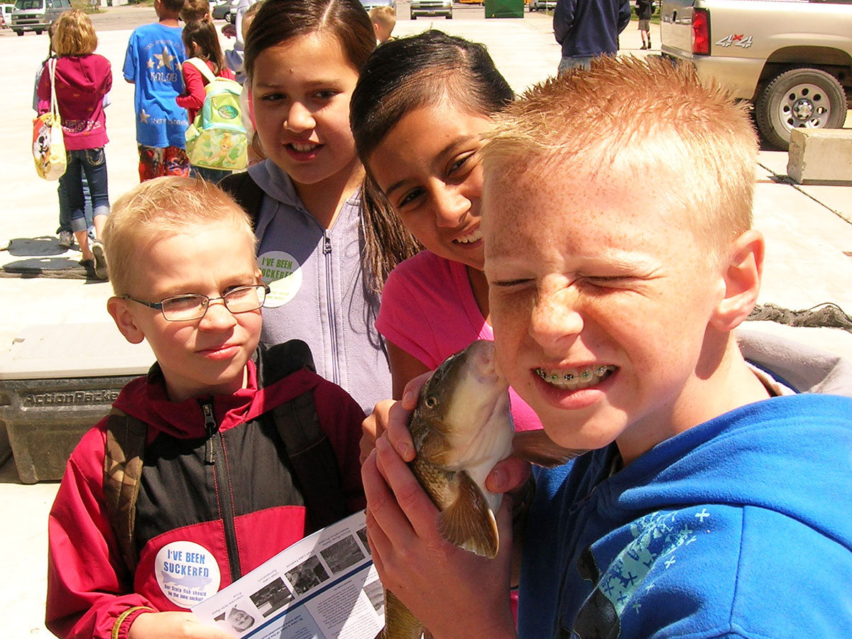 Kids holding June Sucker